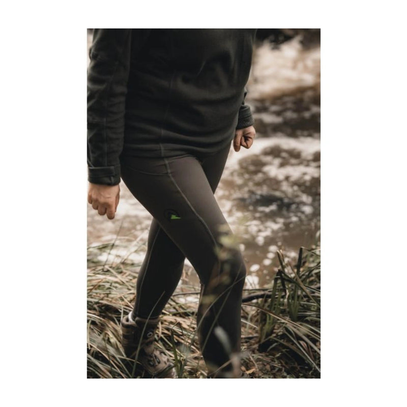 Ridgeline Women's Infinity Leggings | Dark Olive Image Showing Leggings Being Worn On A Bush Walk.