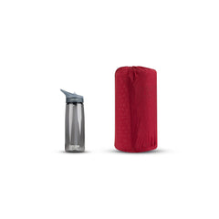 Maroon | Sea To Summit Comfort Plus S.I Regular Mat Image Showing Packed Mat Next To A Water Bottle.