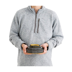 6 Piece | Sea To Summit Frontier Ultralight Collapsible Dinnerware Set Image Showing Dinnerware Packed Down In A Model's Hands.