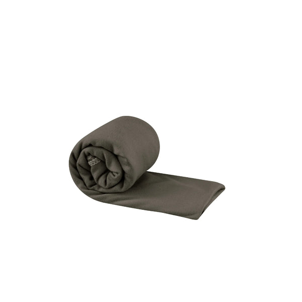 Black | Sea To Summit Pocket Towel Image Showing Towel Out OF The Storage Case Rolled Up.