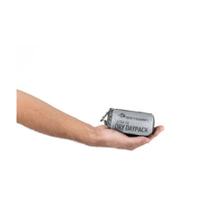 High Rise | Sea To Summit Ultra-Sil Dry Daypack Image Showing Showing Size Comparison To The Palm Of A Hand.