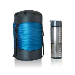 Teal | Sherpa Pemba +5 Sleeping Bag Image Showing Sleeping Bag Rolled Up Next To A Water Bottle.