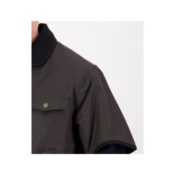 Brown | Swanndri 3/4 Sleeve Oilskin Jacket Image Showing Close Up View Of The Sleeve And Chest Pocket.