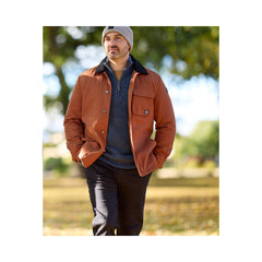 Rusty | Swanndri Barrytown V3 Canvas Jacket Image Showing Jacket Being Worn Outside On A Walk, Buttons Open.