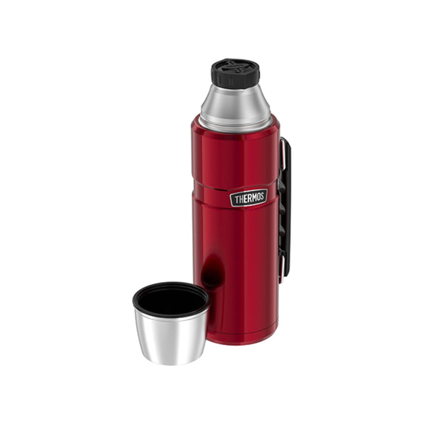 Red / 1.2L | Thermos Vacuum Insulated Stainless Steel Thermos Image Showing Angled Front View With Cap Off.