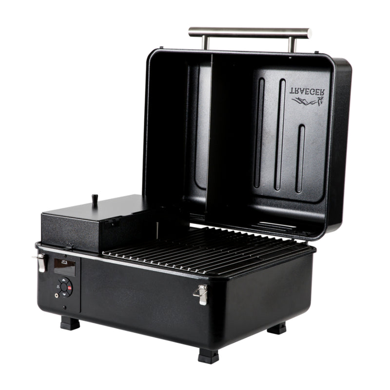 Traeger Ranger Portable Pellet Grill. Angled Front View, Showing Lid Open and Pellet holder to Left of Grill.
