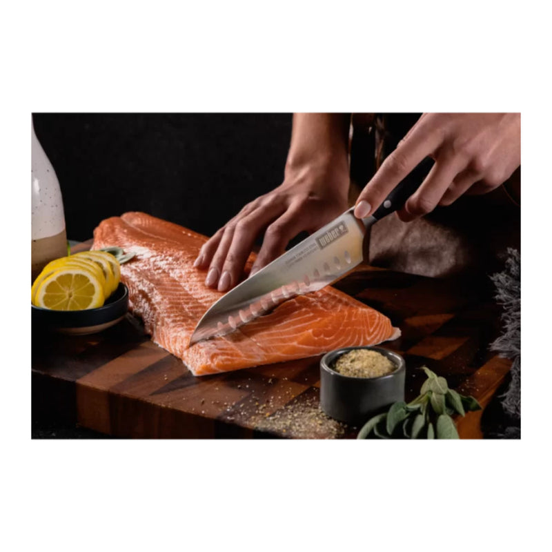 Stainless Steel | Weber 18cm Santoku Knife - Shown Slicing Fish.