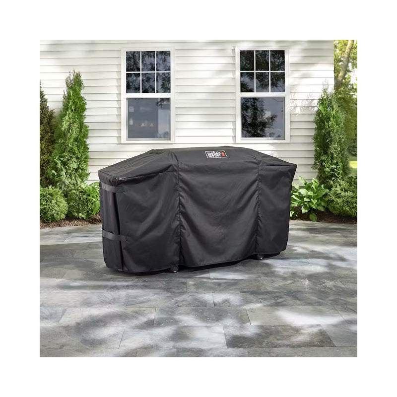 Black | Weber Slate 30 Inch Cover Image Showing Cover On A Slate BBQ Outside.