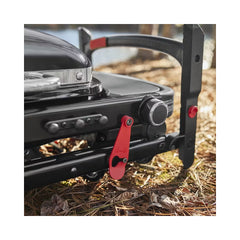 BLack | Weber Traveler Compact Portable Gas BBQ Image Showing Close Up Of The Safety Latch That Keeps The BBQ Closed,  When Not In Use.