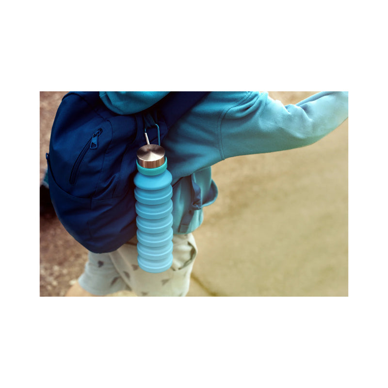 Blue | Wildtrak Expanda Water  Bottle 550ml Image Showing Water Bottle Hanging Off Of A Bag.