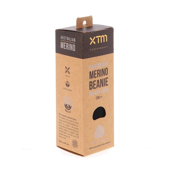 Black | XTM Lightweight Merino Wool Beanie Helmet Liner Image Showing Beanie-Helmet Liner In The Packaging.