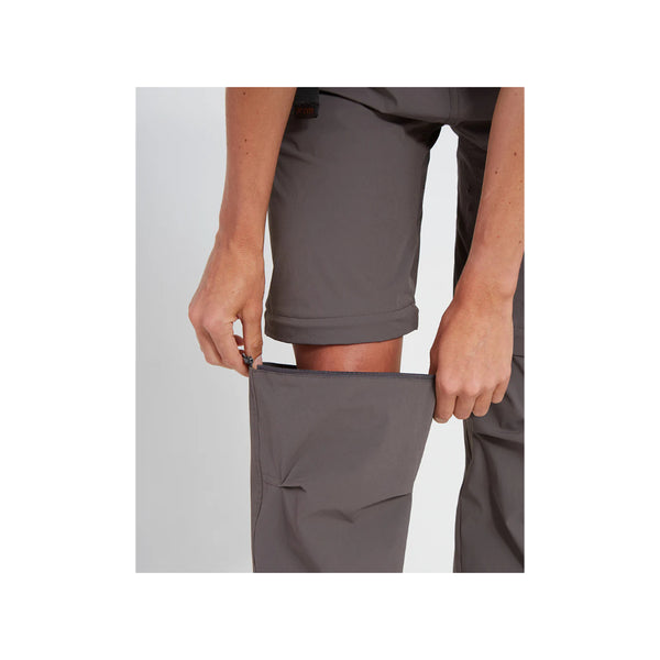 Pavement | XTM Wye River Zip Off Hike Pant Image Showing Close Up View OF One Pant Leg Being Unzipped.