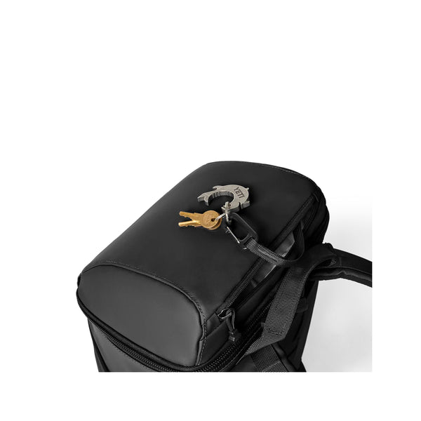 Black | YETI Daytrip Insulated 20L Backpack Image Showing Close Up View Of The Lid Pocket.