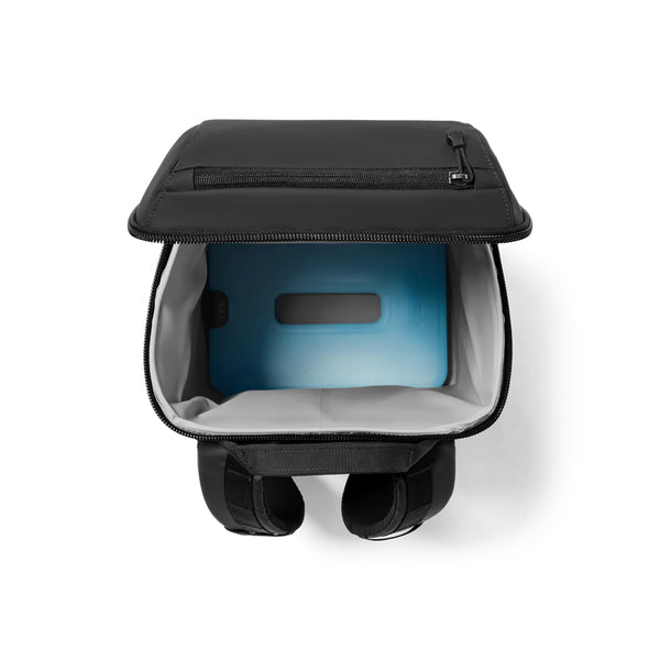 Black | YETI Daytrip Insulated 20l Backpack Image Showing Top View With Top Open, Ice Block In The Bottom Sold Separately.