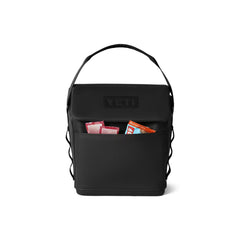 Black / 6L | YETI Daytrip Insulated Lunch Bag Image Showing Front View Pocket Full Of Snack.