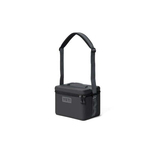 Charcoal | YETI Daytrip Insulated Snack Box 9L Image Showing Angled Side View, With Shoulder Strap Up.