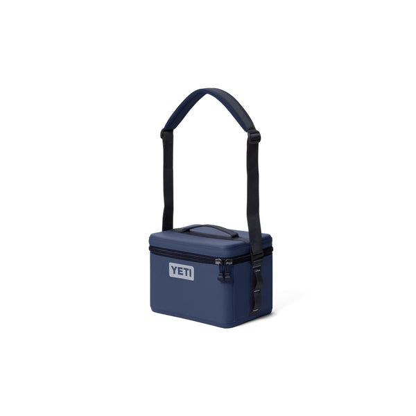 Navy | YETI Daytrip Insulated Snack Box 9L Image Showing Angled Side View, Lid Close With Shoulder Strap Up.