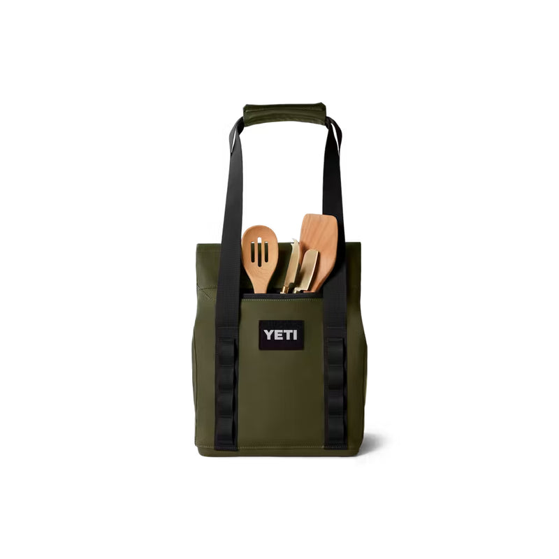 Olive / 14L | YETI Daytrip Insulated Tote Bag Image Showing Back View Of Zippered Pocket Being Used to Hold Utensil's, Handles Up.