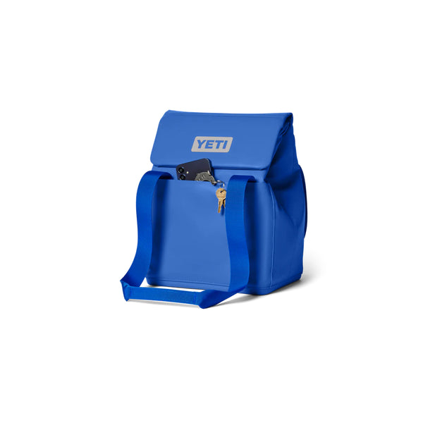 Royal Blue | YETI Daytrip Insulated Tote Bag 14L Image Showing Angled Front View Handles Down.
