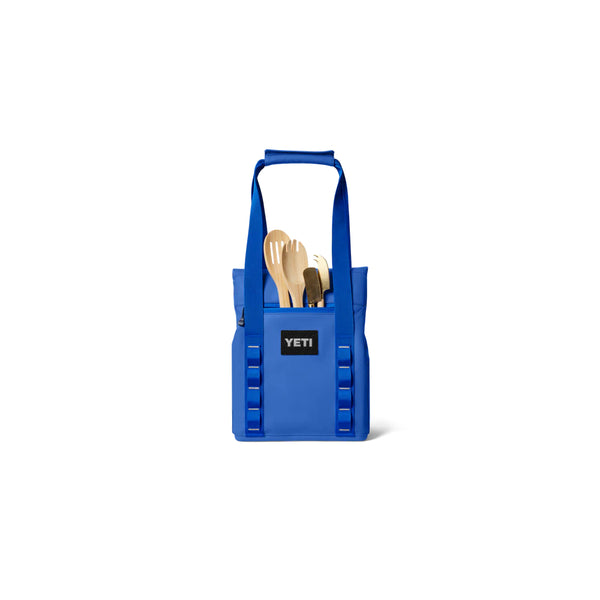 Royal Blue | YETI Daytrip Insulated Tote Bag 14L Image Showing Back View, Handles Up And Things In The Pocket.