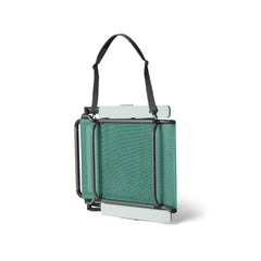 Seafoam | YETI Hondo Beach Chair Image Showing Side View Of The Chair Folded Down, With Carry Strap Attached.