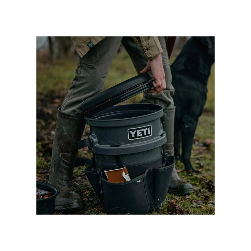 Black |YET Loadout Bucket Swivel Seat Image Showing Finger Release Being Used To Take The Swivel Seat Off Of A Loadout Bucket(Loadout Bucket And Accessories NOT Included).