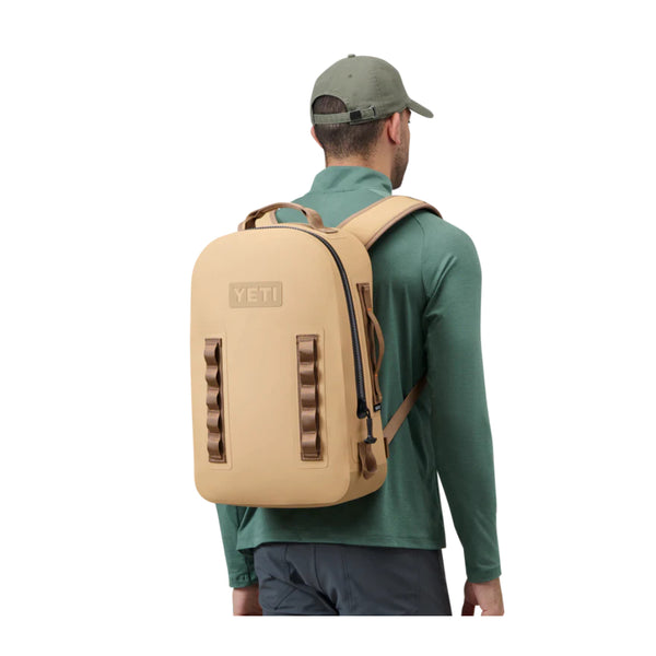 Tan | YETI Panga Submersible Backpack - 28L. Shown on Model. 