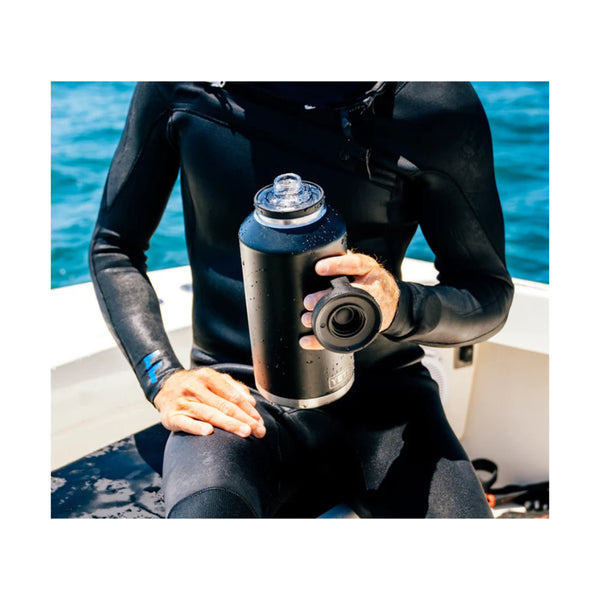 Black | YETI Rambler Bottle Chug Cap Image Showing A model Using A YETI Rambler Bottle With Cap/ Handle Off.