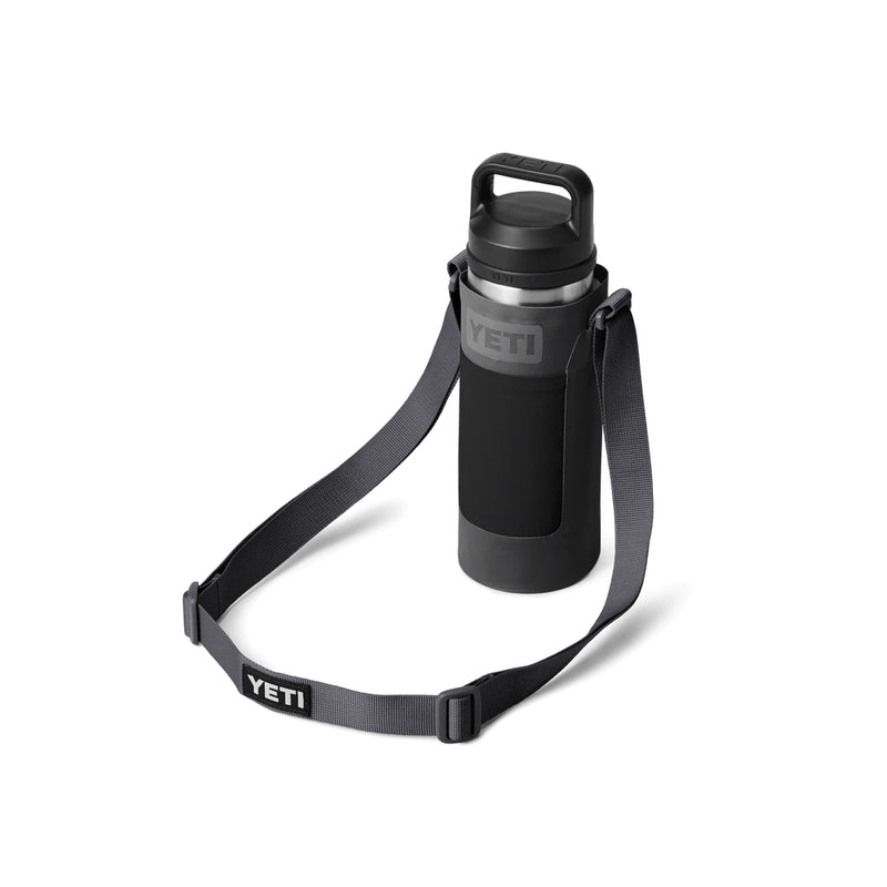 Charcoal | YETI Rambler Bottle Sling Small Image Showing 18oz Bottle In Sling, Strap Down Angled View.
