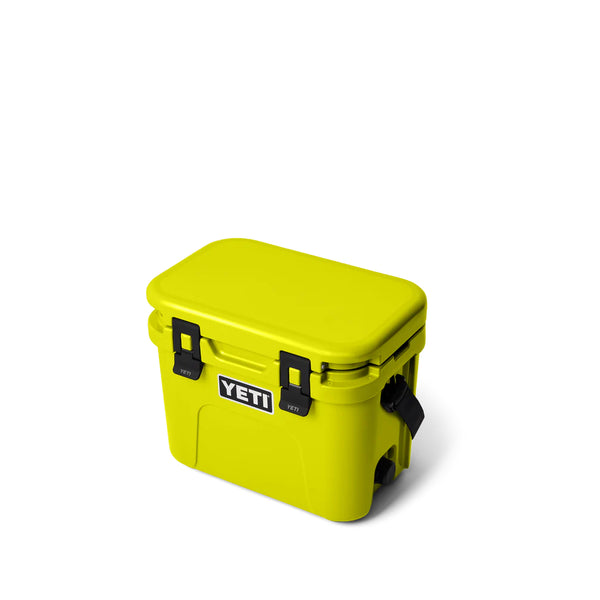 Firefly Yellow | YETI Roadie 15 Hard Cooler Image Showing Angled Side View, Lid Closed.