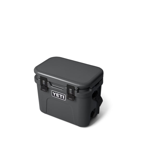 Charcoal | YETI Roadie 15 Hard Cooler Image Showing Angled Side View With Lid Closed.