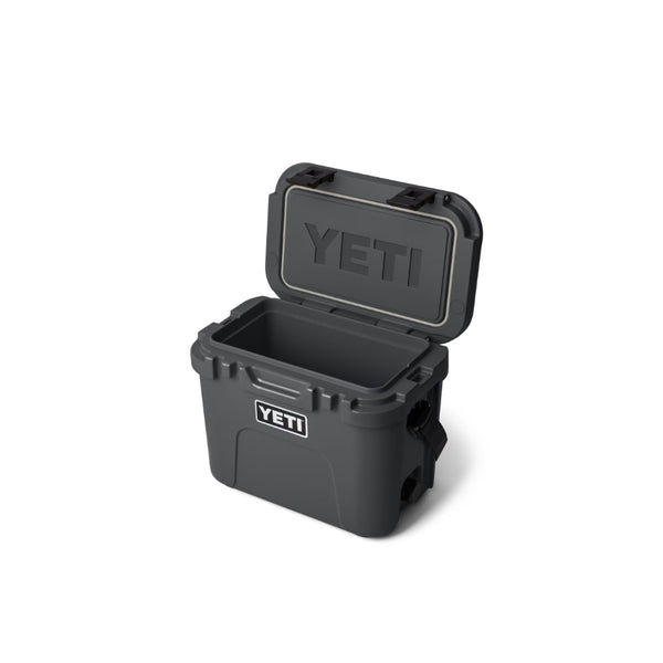 Charcoal | YETI Roadie 15 Hard Cooler Image Showing Angled Side View With Lid Up.
