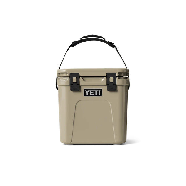 Tan | YETI Roadie 24 Hard Cooler 2.0 Image Showing Front View With The Handle Up.