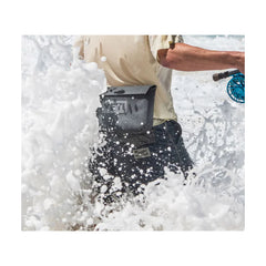 YETI Sidekick Dry 3L | Image Showing The Sidekick Being Used While Fishing On The Beach.