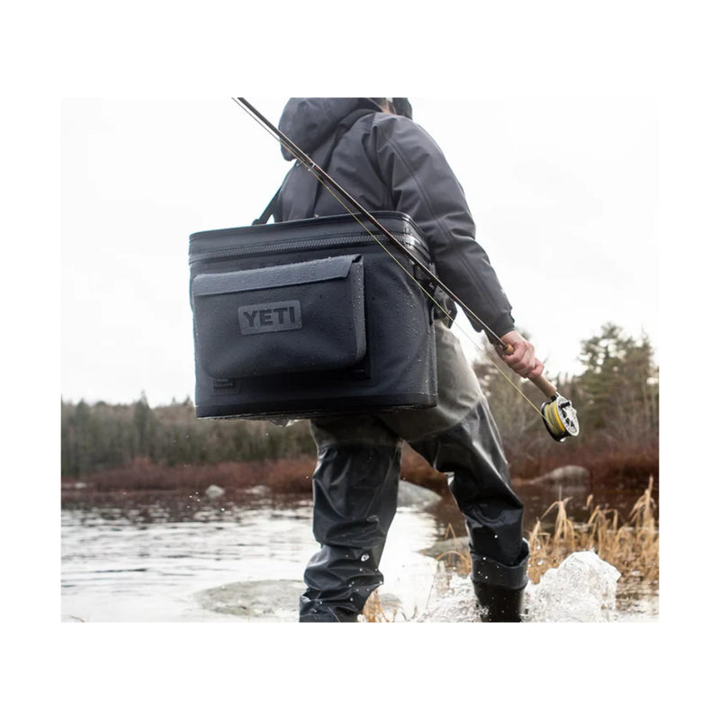 YETI Sidekick Dry 3L | Image Showing The Sidekick Being Used While Fishing.