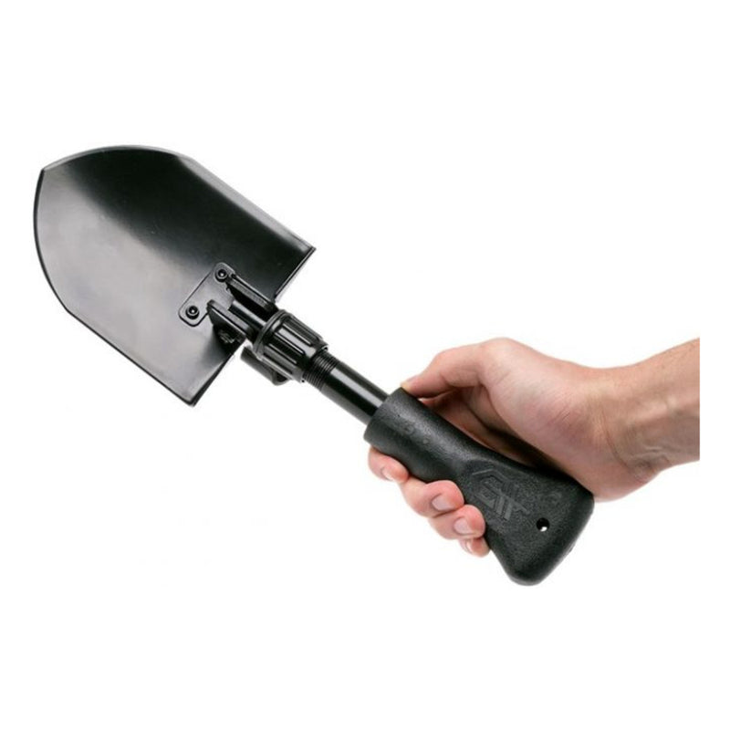 Black | Gerber Gorge Folding Shovel With Nylon Bag Image Showing Shovel Open In A Models Palm.