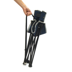 Collapsed stool being held by carry strap