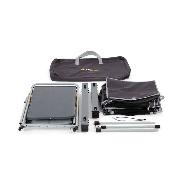 Pack contents laid out next to carry bag