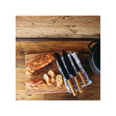 Knives in Use on Bread Board. 