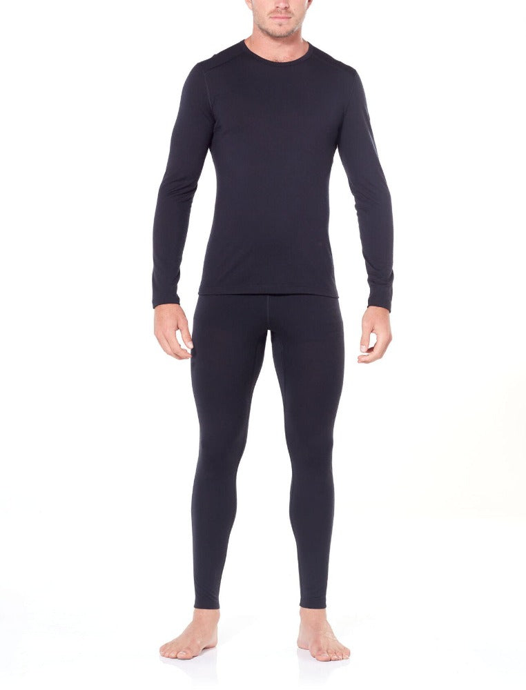 Black | Icebreaker Mens 200 Oasis Thermal Leggings. Modelled Full Body Front View With Matching Long Sleeve Thermal Shirt.