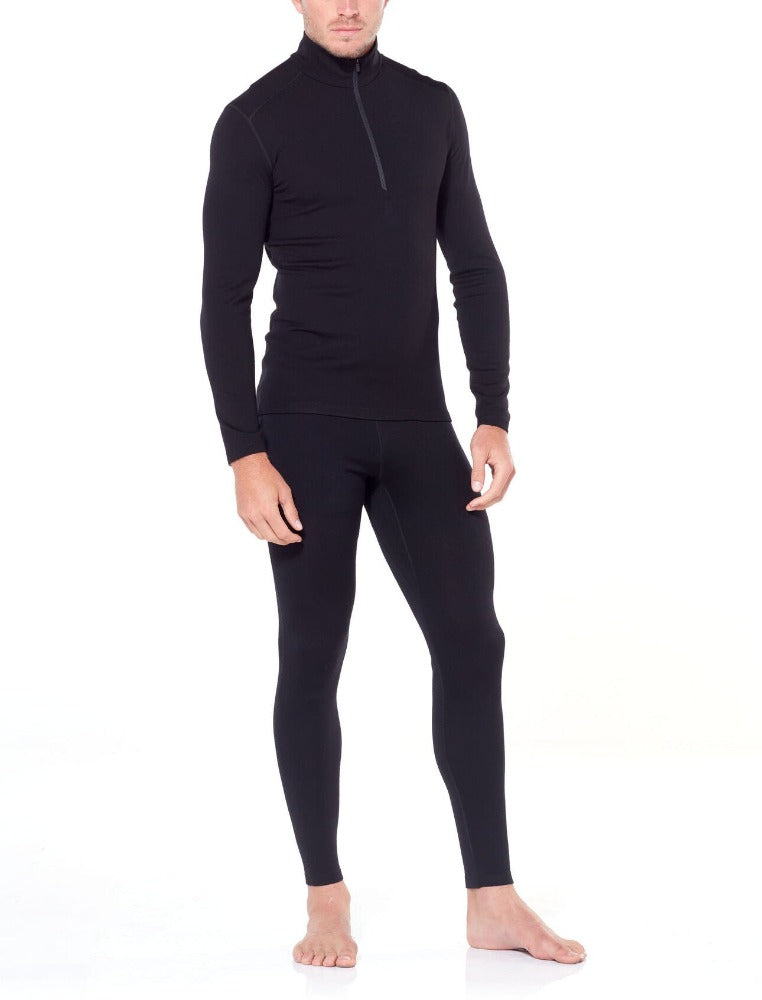 Black | Icebreaker Mens Merino 260 Tech Long Sleeve Half Zip Thermal. Full Body Front View With Matching Leggings