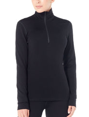 Black | Modelled Front View. Icebreaker Women's 260 Long Sleeve Tech Half Zip | Thermal Wear