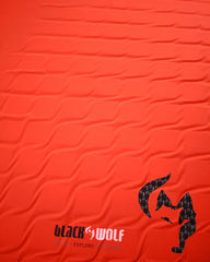 True Red | Close up of soft stretch top fabric.