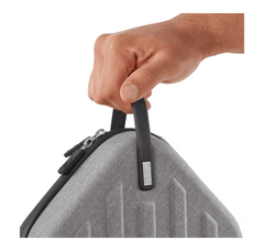Carry Case handle being held by a hand
