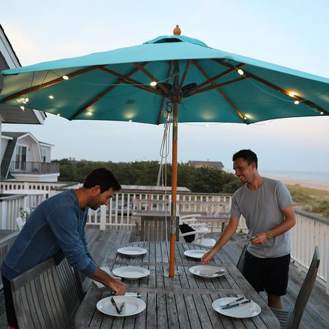 In use under a table umbrella