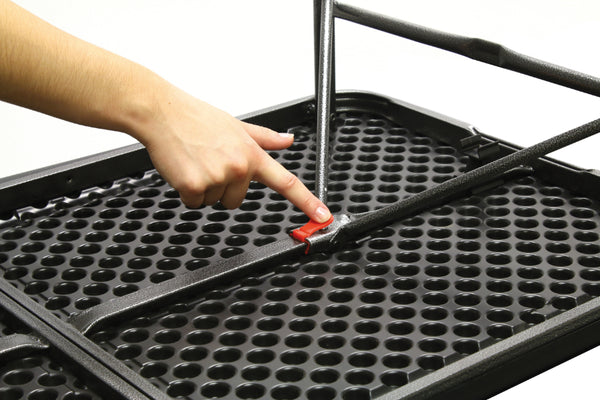 Black | Oztrail Ironside Fold In Half 120cm Table Image Showing Quick Release Locking Mechanism.