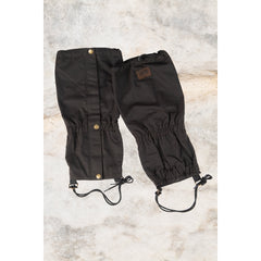 Burke And Wills Oilskin Gaiters. With marble coloured background