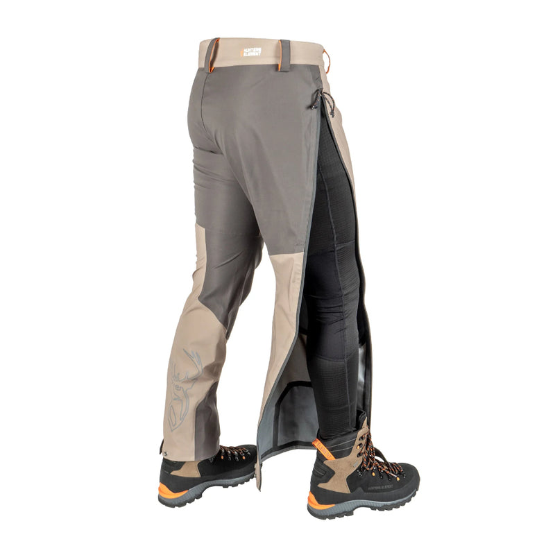 Sand Charcoal | Hunters Element Atlas Pants Back Angled View Showing Leg Vent Open. 