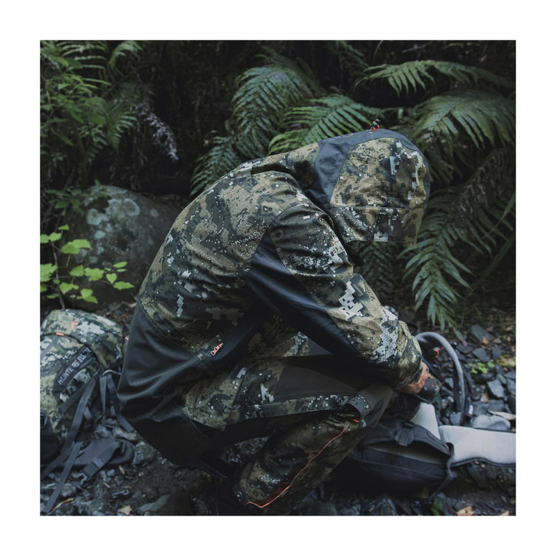 Desolve Veil | Hunters Element Odyssey Jacket Shown on Model in Bushland. 