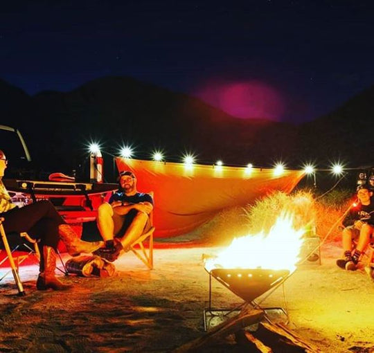 In use at a campsite with a firepit 